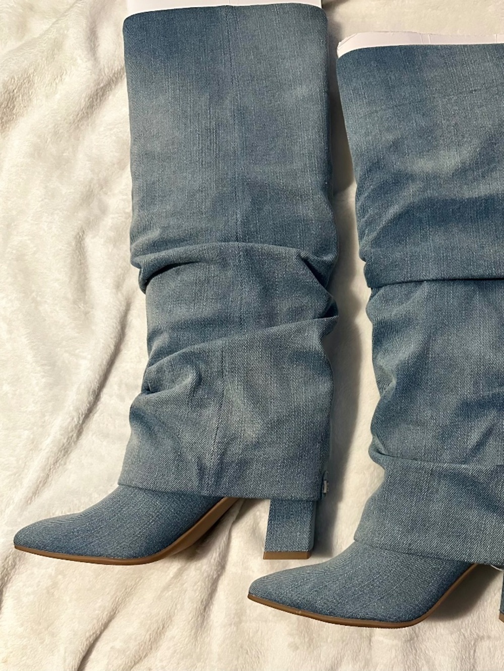 Blue denim boots.